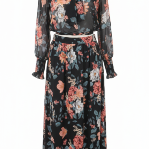 Conjunto negro de blusa con lazo y falda larga floral.