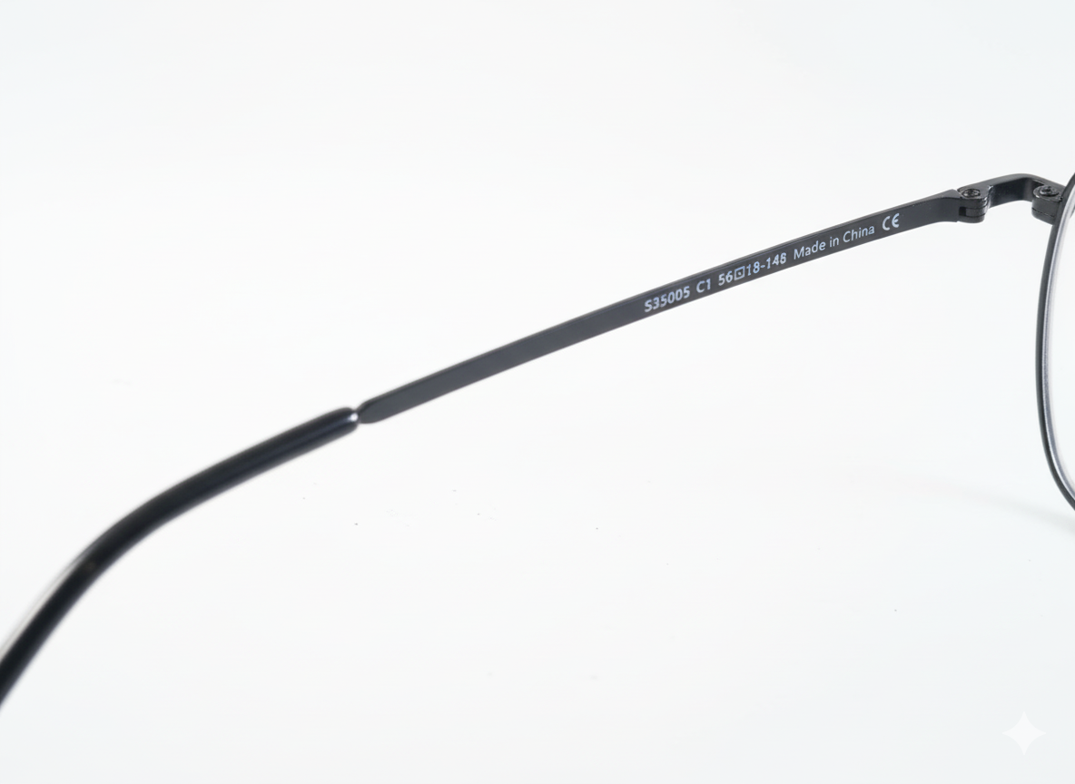 Lado de la montura metálica negra mate con patilla fina