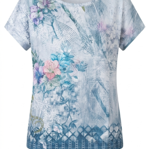 Camiseta mujer talla S, color azul claro con estampado de flores rosas y azules y detalles geométricos, fondo blanco.